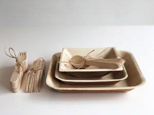 Palm leaf plates and bowls with cutlery for weddings events parties